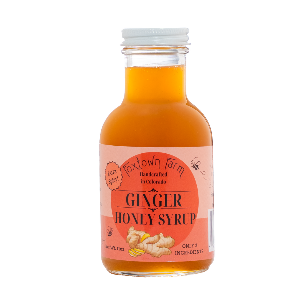 Front view of 11 oz Ginger Honey Syrup made with organic ginger and pure honey.
